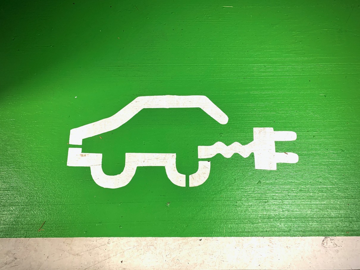 Floor markings indicate an EV parking space. Floor markings indicate an EV parking space.